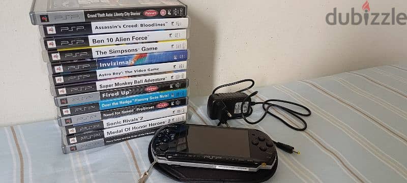 PSP 3000 series with 13 games 0