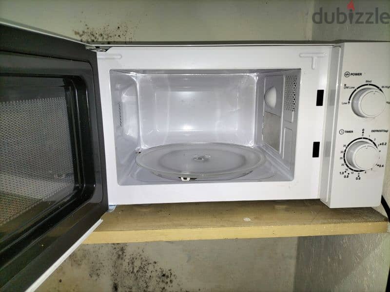 microwave oven midea like new 60$ v 1