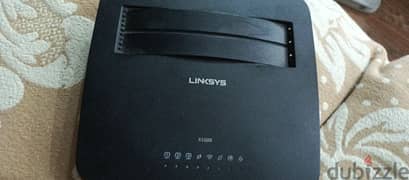 router Linksys model x1000 look at the last photo for details 0