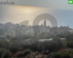 Land located in a clam area in kfaraabida/كفرعبيدا  REF#NE111827 0