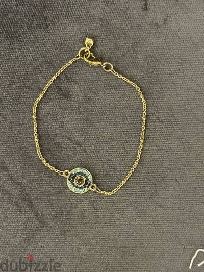 nine west bracelet, eye with blue and gold color