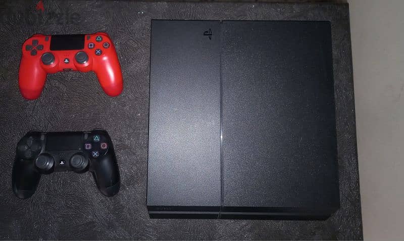 ps4 + 2 controller's + 5 video games 0