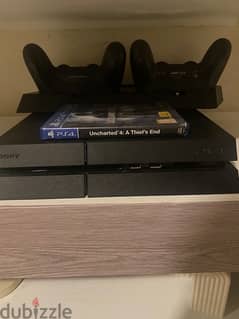 ps4 fat 500gb with two controllers and 1 cd 200$