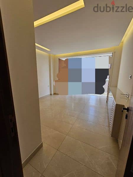 Open View l Luxurious 350 SQM Apartment in Ain Al Tineh. 9