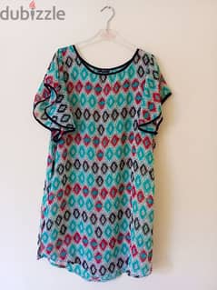 Dresses and tops multiple colours and sizes