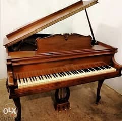 بيانو حجم وسط خشب جوز طبيعي ألماني الصنع روعة من الروائع بسعر لقطة 0
