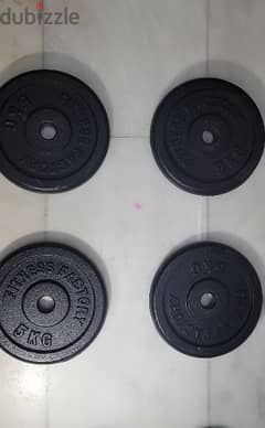 metal plates with dumbbels and barbell (negotiable price)