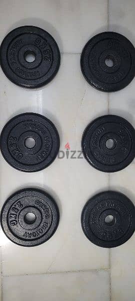 metal plates with dumbbels and barbell (negotiable price) 1