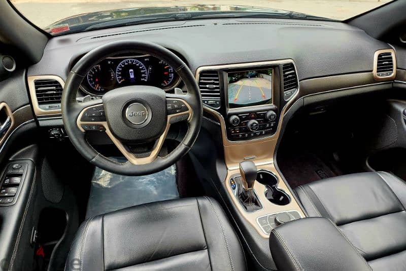 Grand Cherokee 2017 CLEAN CARFAX LIMITED V6 4WD اجنبي شبه جديد 15