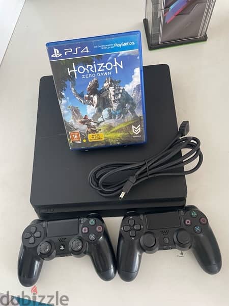 ps4 slim with 2 controllers and cd horizon 0