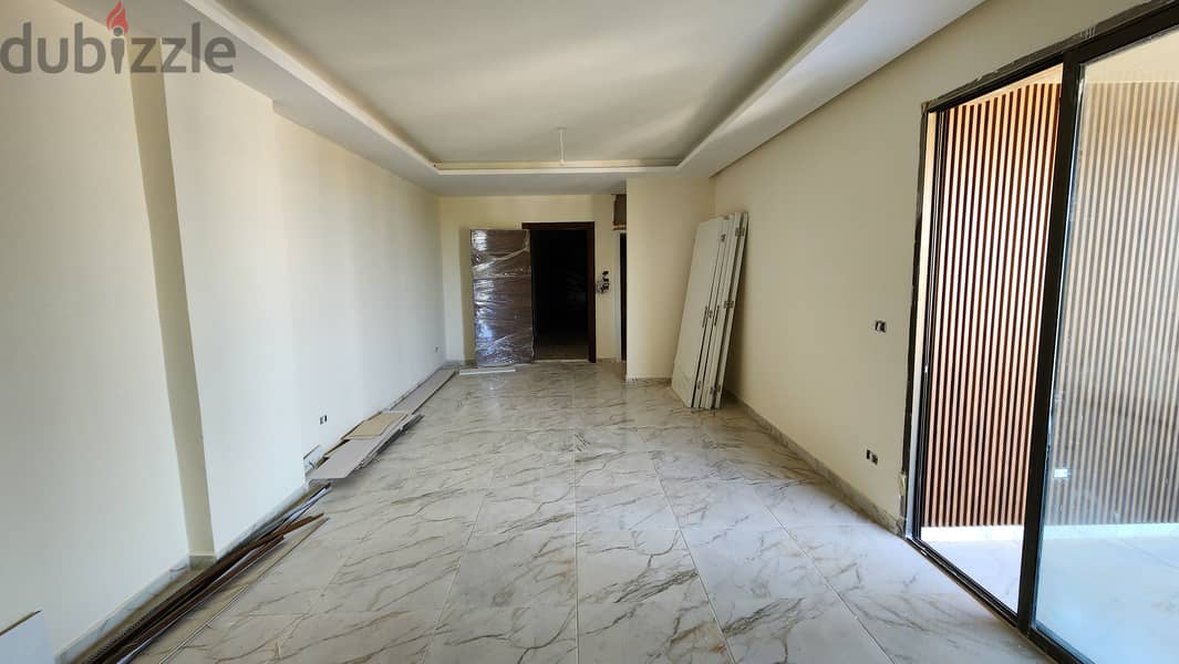 Apartment for sale in Boutchay | Installment plan شقة للبيع ب بوتشاي 1