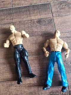 2 WWE action figures.