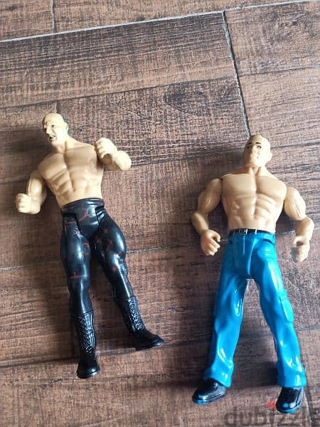 2 WWE action figures. 0