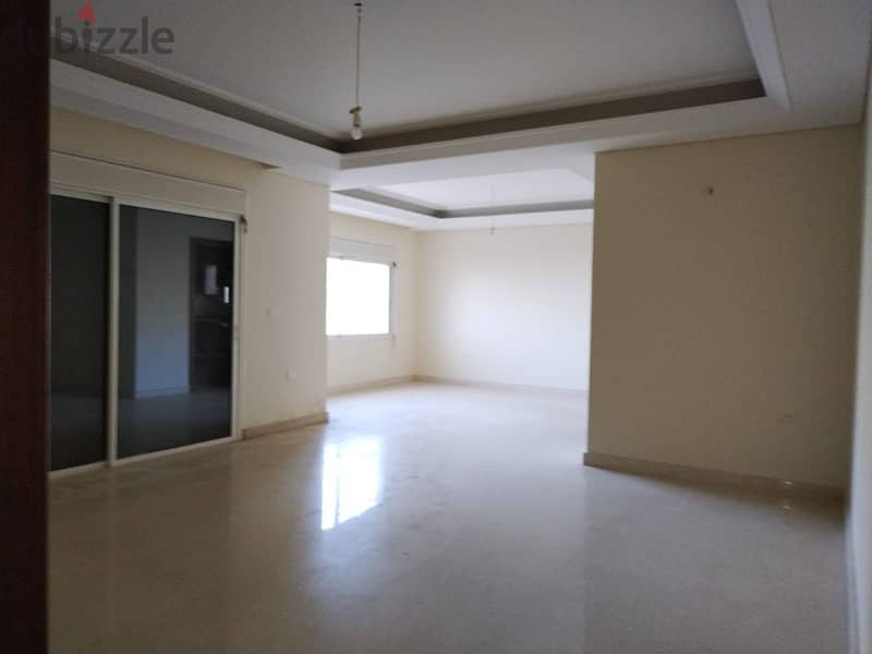 L16007-Spacious Apartment with Garden and Terrace For Rent in Sahel Al 1