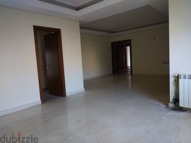 L16007-Spacious Apartment with Garden and Terrace For Rent in Sahel Al 3