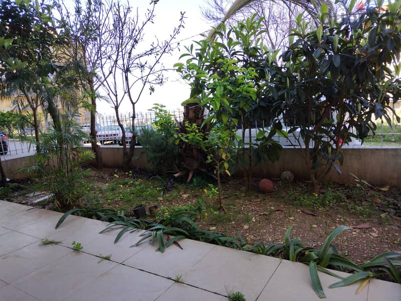 L16007-Spacious Apartment with Garden and Terrace For Rent in Sahel Al 4