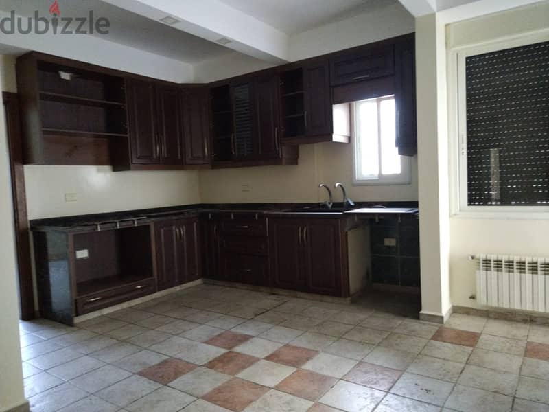 L16007-Spacious Apartment with Garden and Terrace For Rent in Sahel Al 6