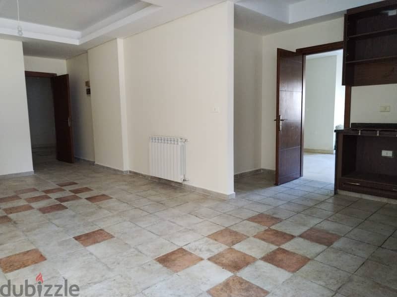 L16007-Spacious Apartment with Garden and Terrace For Rent in Sahel Al 7