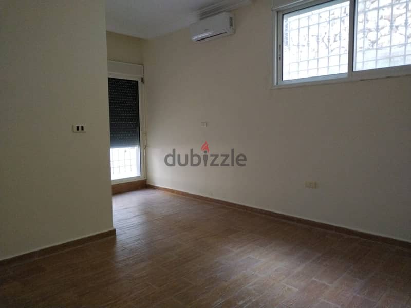 L16007-Spacious Apartment with Garden and Terrace For Rent in Sahel Al 11