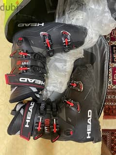 head ski boots and bag 0