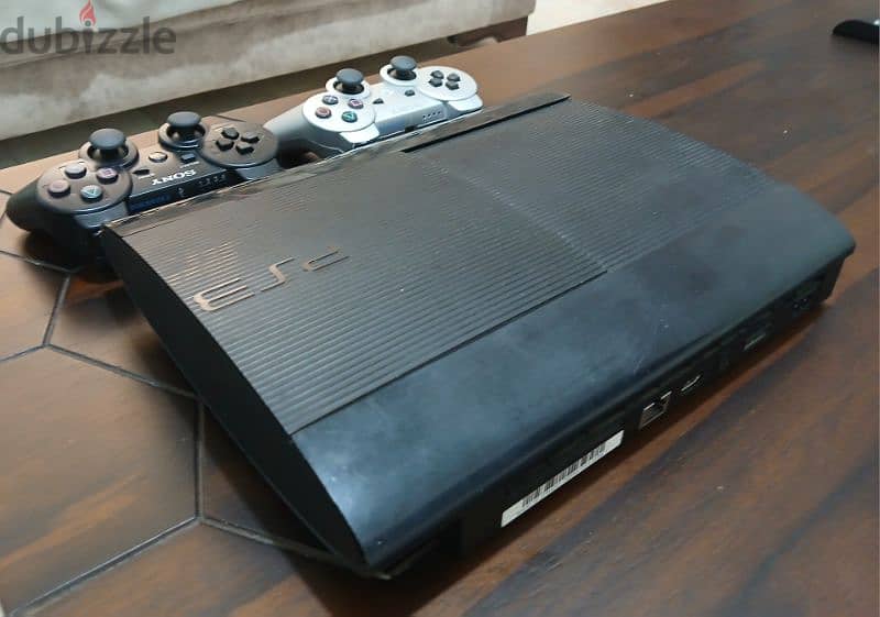 Ps3 Super Slim, 70$, 70732874,معها مسكتين 1