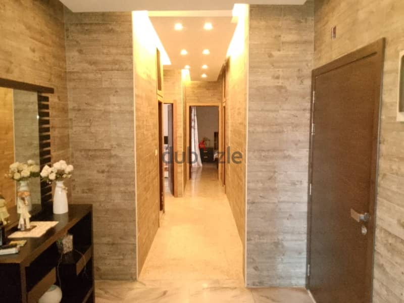 190 Sqm | Decorated Apartment For Sale In Dawhet El Hoss |Partial View 3