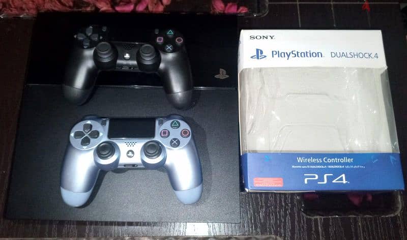 ps4 1 Tera byte , with 2 controllers and all cables and games 1