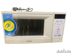 microwave samsung الاصلية كبساتها بعلقو 0