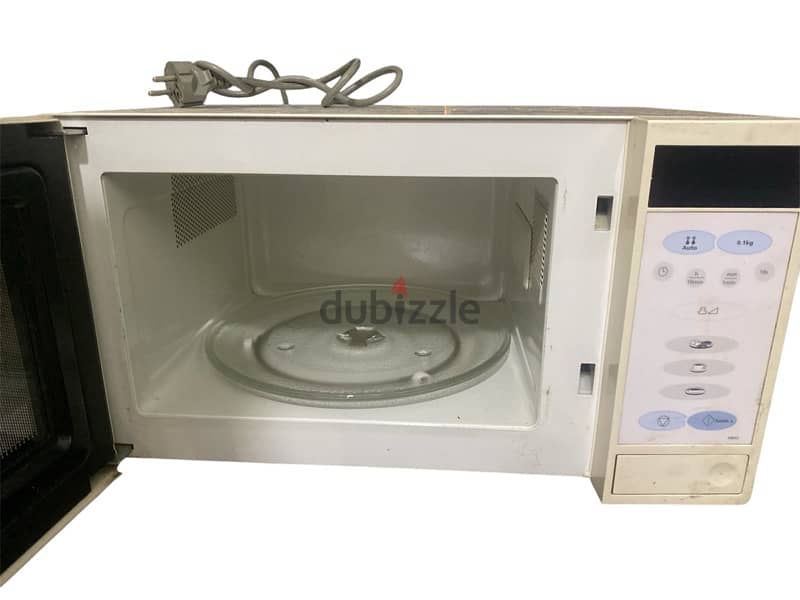 microwave samsung الاصلية كبساتها بعلقو 1