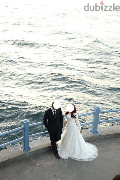 Wedding dress with accessories, designed by a designer. 1