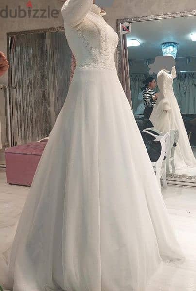 Wedding dress with accessories, designed by a designer. 2