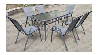 Outdoor Glass Table with 6 chairs