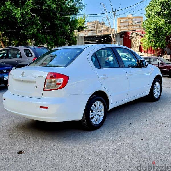 Suzuki SX4 2014 GLX full خارقة و مميزة 3