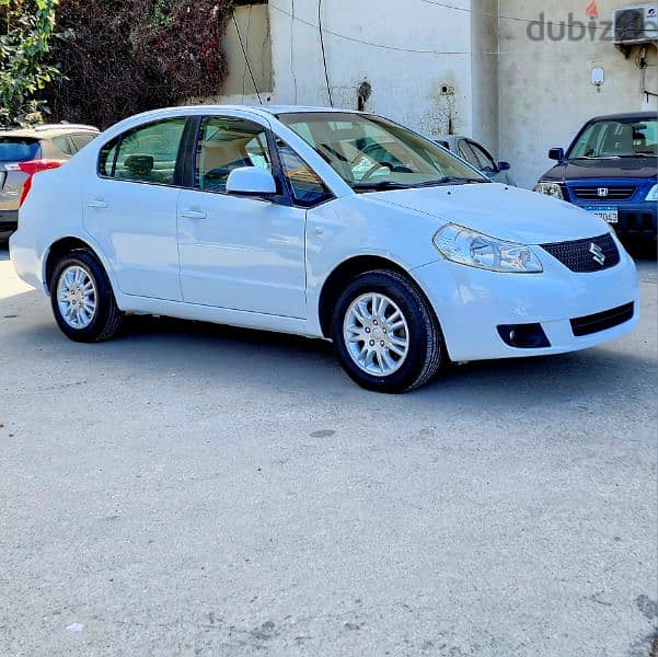 Suzuki SX4 2014 GLX full خارقة و مميزة 4