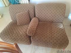 2 movible brown sofas