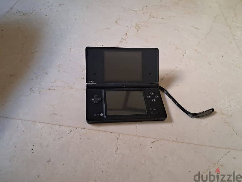 Nintendo dsi xl + nintnedo dsi + charger + R4 card 7