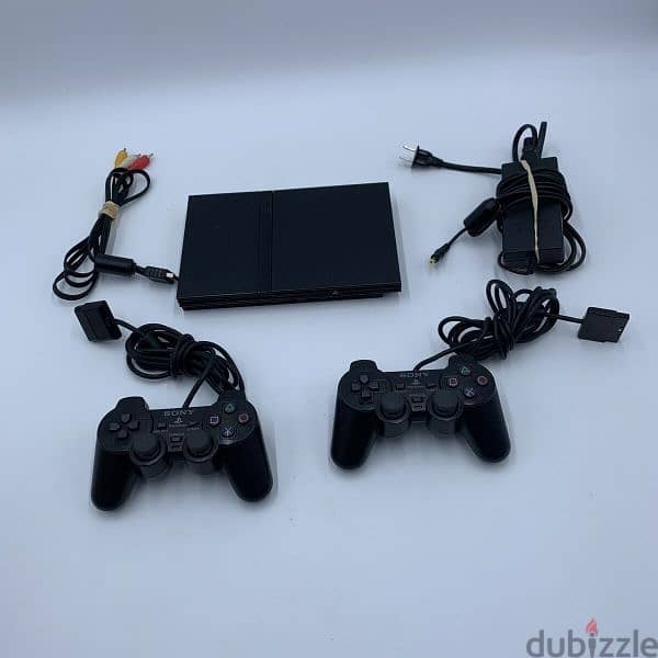 ps2 original with 5 cds original and memory card 2