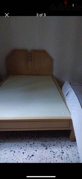 2 wooden beds 1