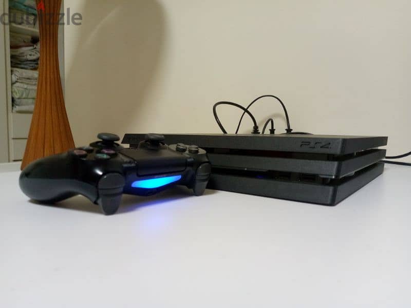 PS4 pro best condition with 2 controller and 4 cds 0