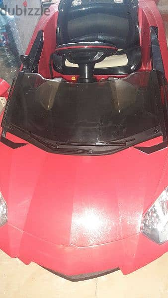 Electric kids car red very good condition. 1