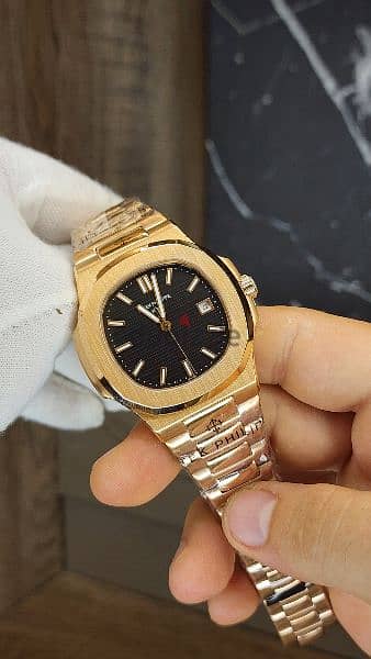 patek philippe nautilus rose gold with black dial 1