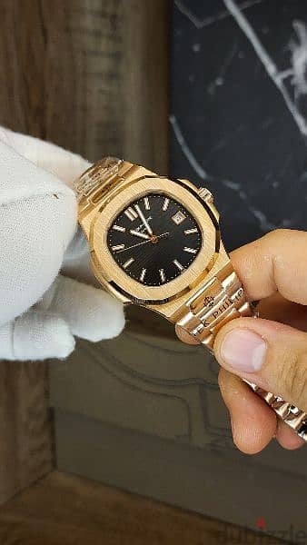 patek philippe nautilus rose gold with black dial 4