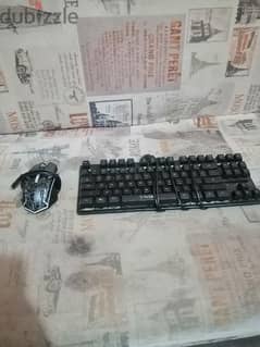 keyboard, mouse and mouse pad 0