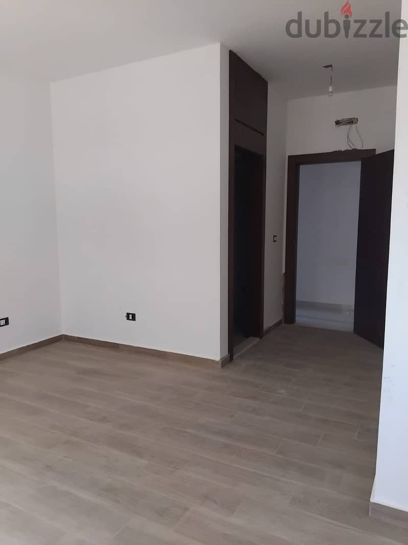 Apartment for sale in Kfaraabida شقة للبيع في كفرعبيدا 9