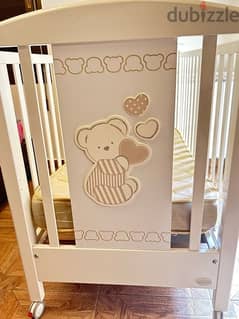 baby crib with mattress from pink and blue