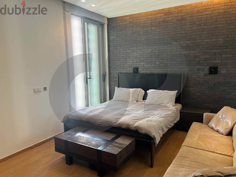 Semi furnished apartment in prime Achrafieh tower/أشرفية REF#OJ112828 8