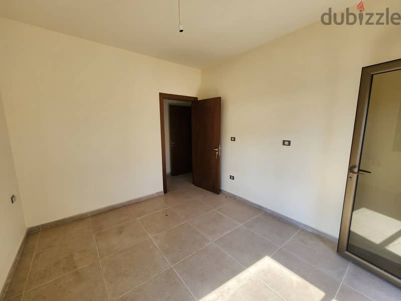 RWB138EA - Apartment For Sale In Bouar - شقة للبيع في البوار 4