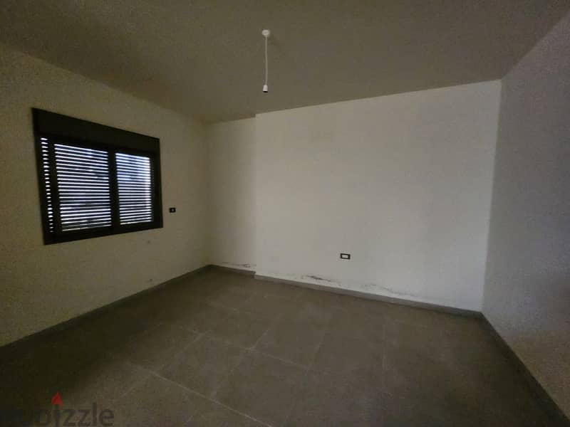 RWK141EA - Apartment  For Sale In Bouar  - شقة للبيع في البوار 5