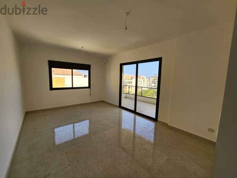 RWB143EA - Apartment  For Sale In Bouar - شقة للبيع في البوار 2