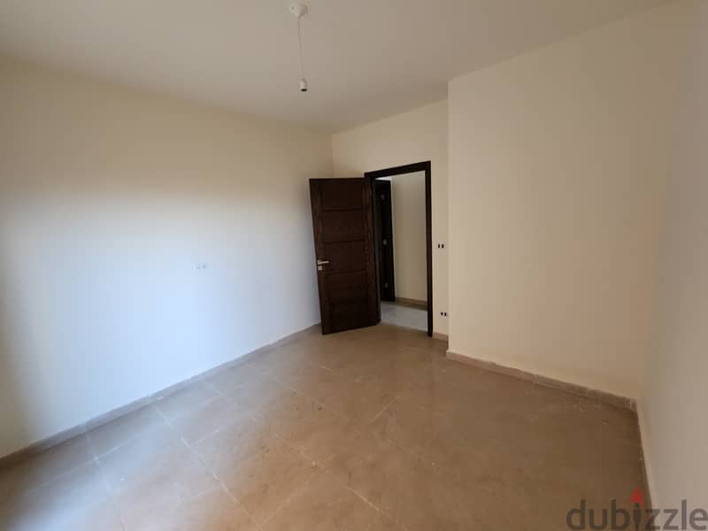 RWB147EA - Apartment  For Sale In Bouar - شقة للبيع في البوار 10